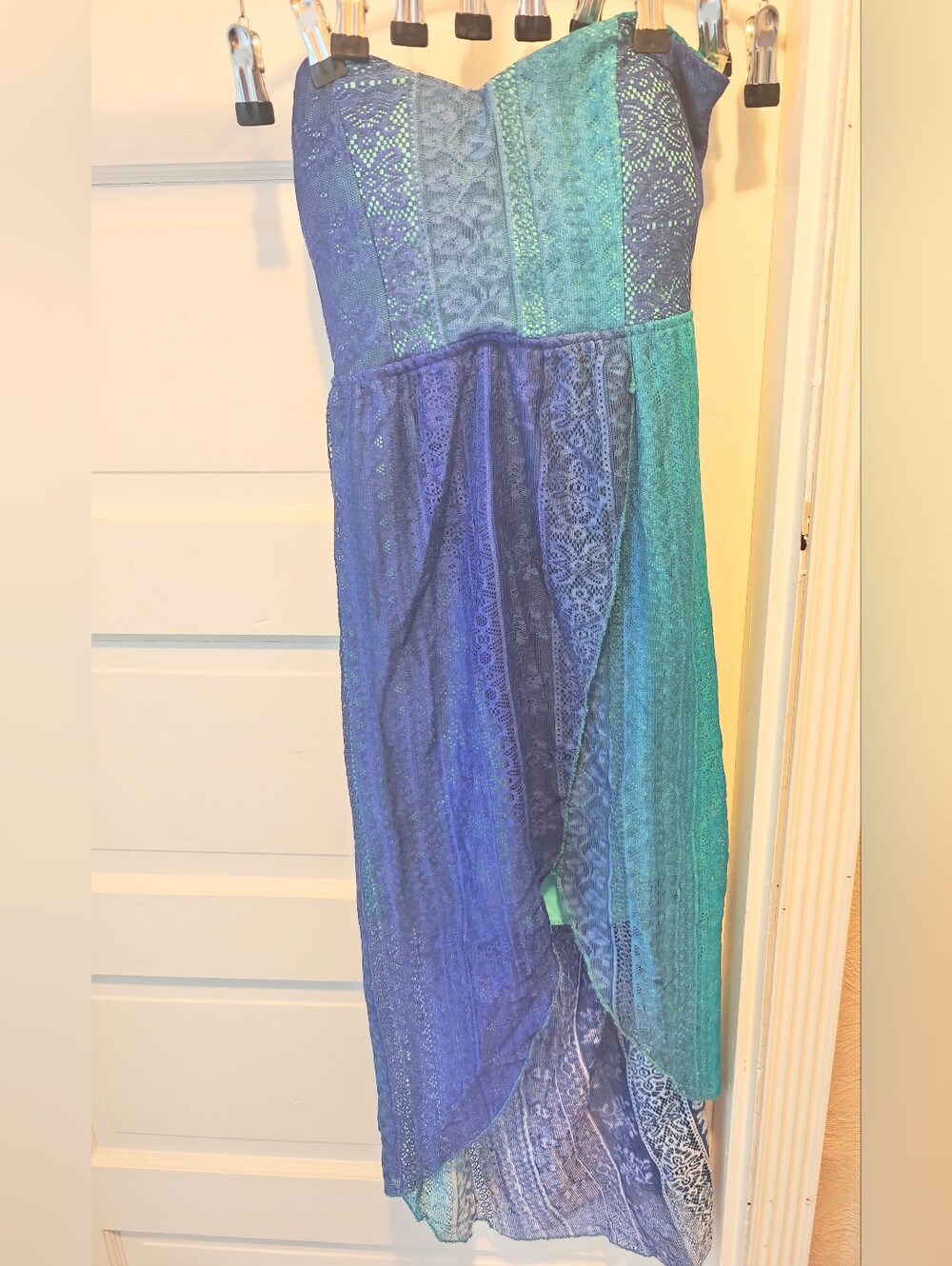 A women's new with tags rue21 blue and teal fancy dress in size M. This dress is